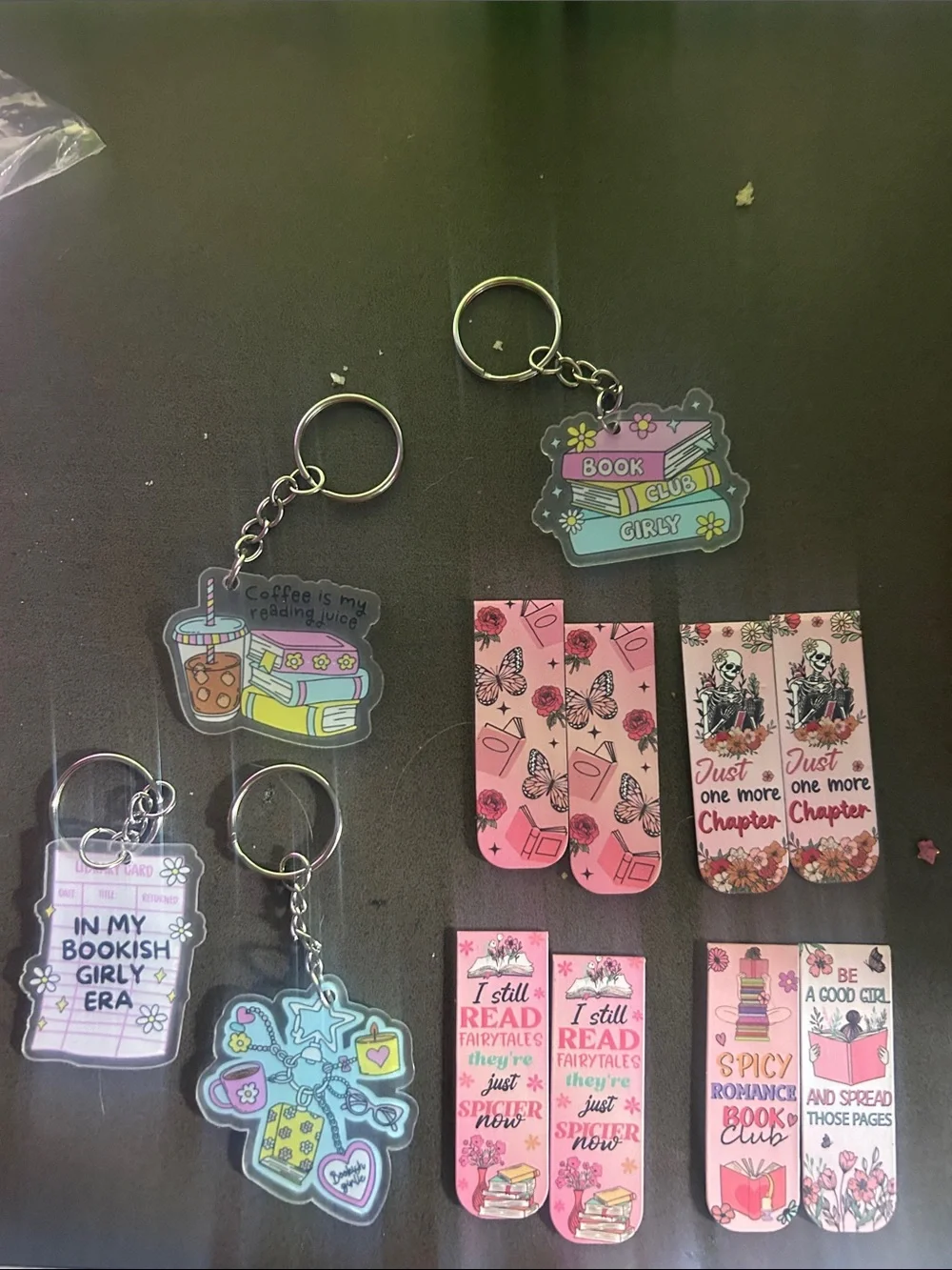 Book club keychain and bookmark tchotchkes